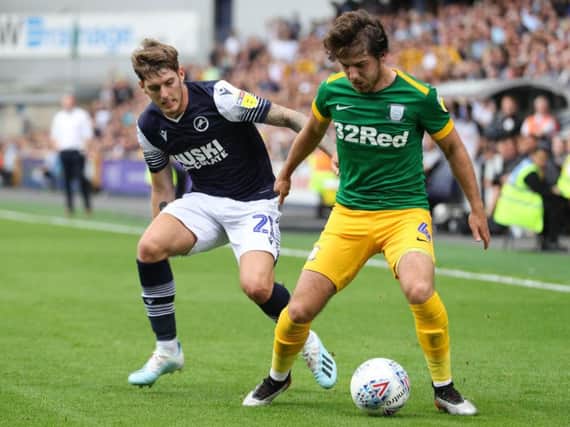 Preston midfielder Ben Pearson shields the ball from Millwall's Connor Mahoney