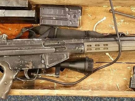 Officers found a deactivated rifle and two gas-powered air weapons.