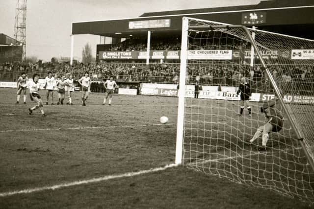 John Kelly fires home Prestons fourth goal against Wigan Athletic at Deepdale on January 1, 1983