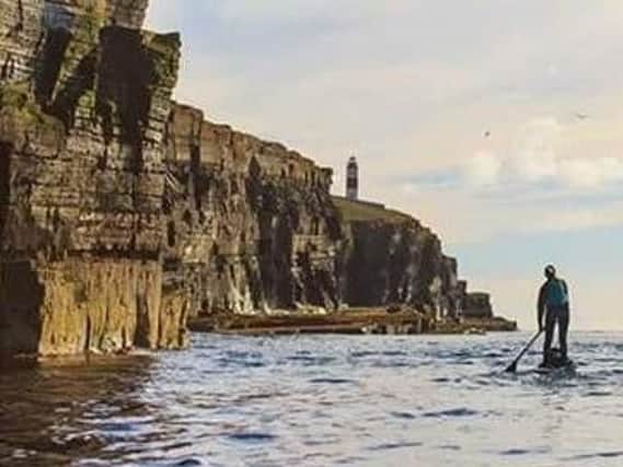 Cal Major made a world record when she completed a stand up paddleboarding expedition from Lands End to John OGroats in 2018. Pic: Cal Major