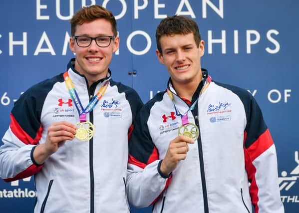Myles Pillage (left) and Oliver Murray on the podium after winning European Championship men's relay gold during day two of the 2019 European Modern Pentathlon Championships at the University of Bath