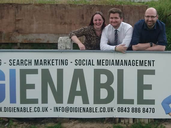 Liz Hardwick and Darren Jenkinson of DigiEnable with  Josh Vosper, Commercial Manager at Chorley FC (centre)
