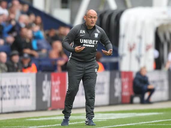 Preston manager Alex Neil on the touchline during the win against WIgan
