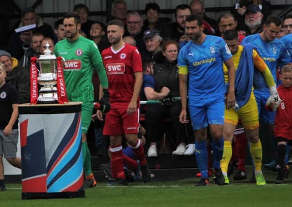Longridge Town and Barnoldswick Town had the FA Cup for company in their extra preliminary round meeting last Saturday