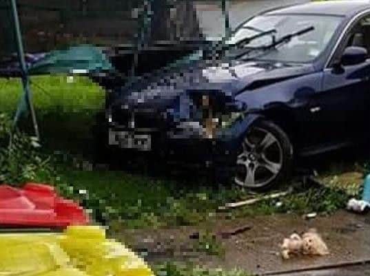 Two men were arrested after a BMW crashed into a children's trampoline in the front garden of a family home in Ribbleton Hall Drive on Wednesday (August 13). Pic: Vicki Louise
