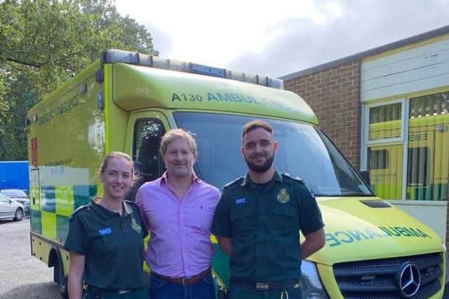 Heart attack survivor Anthony Foster with paramedics Lisa Carne-Ross and Andy Utting