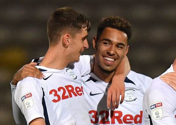 Tom Bayliss and Andre Green celebrate after the 4-0 win at Bradford City
