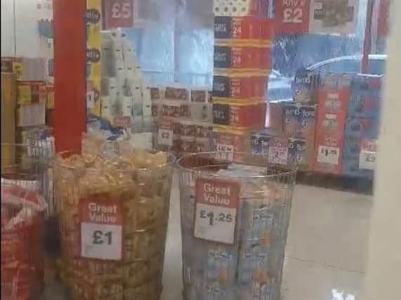 Shoppers have been evacuated from the Iceland store off Ringway, Preston after torrential rain caused a pipe to burst and flood the store