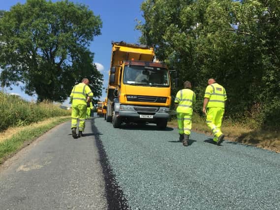 The "surface dressing" technique has been credited with a reduction in the number of potholes across Lancashire