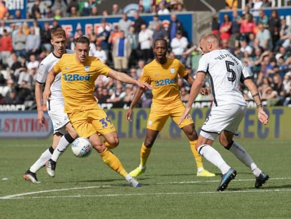 Billy Bodin and Daniel Johnson in the thick of the action at Swansea