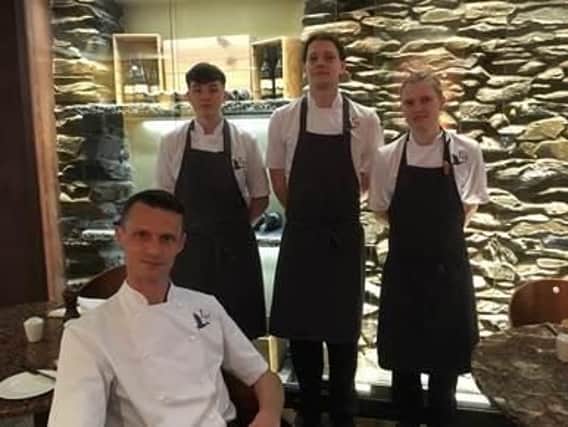 Lakeside Hotel and Spa  Head Chef Richard Booth with Runshaw College students (left-right) Ashton Wade, Jake Bell and Eleanor Taylor.