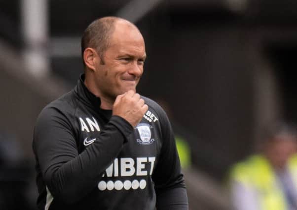 North End boss Alex Neil prowling the touchline during Saturday's defeat at Swansea