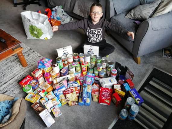 Joshua Blackwell (8), who attends Farington Moss St Paul's CE Primary School, has spent nearly every day of his summer holidays collecting hygiene products, non-perishable food and warm clothing for the homeless.