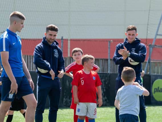 The players visit soccer school
Photo: Ian Robinson/PNE