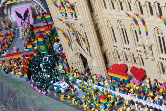 Manchesters most iconic buildings have had a special rainbow makeover and a host of party scenes capturing the celebratory nature of the weekend have been added.