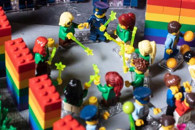 As a nod to the incredible work the emergency services do to keep the public safe through Pride, the attraction has been sure to add plenty of police officers and members of the fire service to the scenes.