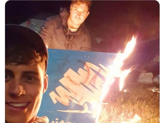 The Tweet from coun Freddie Bailey in the foreground, where he appears to be celebrating having reached 40,000 Twitter followers with others burning a Conservative party poster.He has since deleted the Tweet.