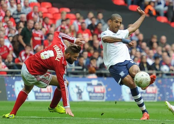 Jermaine Beckford scores Preston's third against Swindon  he netted a hat-trick in the game