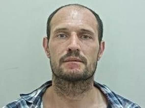 Paul Hope, 39, from Preston, is wanted on recall to prison for a breach of his licence. Pic - Lancashire Police