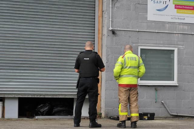SAP IT, whose signage appears on a unit, said it vacated the premises 10 months ago and has no involvement in any criminal activity at the site