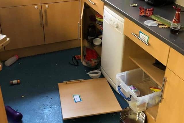 Cupboards ripped off kitchen doors