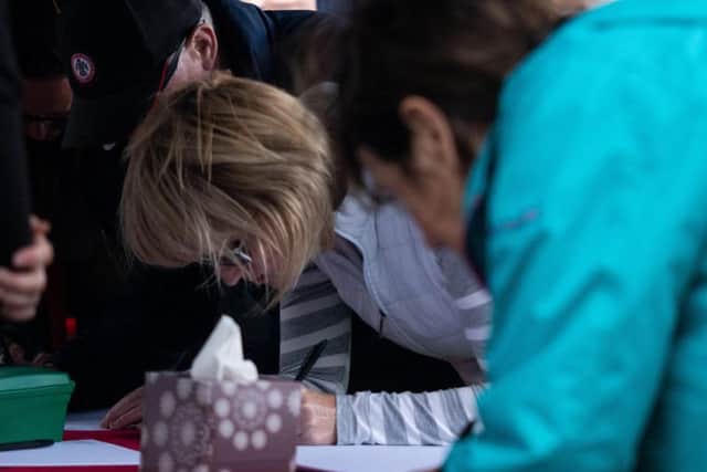 A book of remembrance was opened for residents to sign.