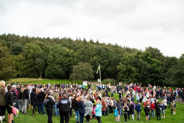 A unified community took to Peel Park, near The Coppice in Accrington yesterday evening (August 29) before walking together to a memorial area where flowers were laid