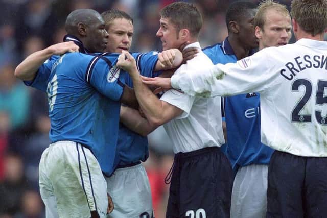 City's Shaun Goater and PNEs Chris Lucketti clash in October, 2001  Preston won the match 2-1