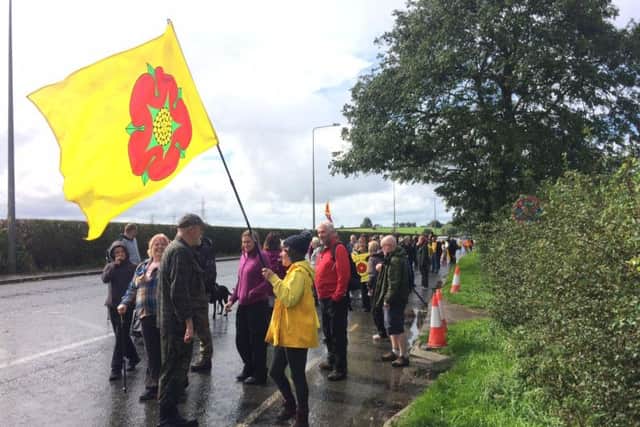 Protesters in Lancashire marched against fracking to the beat of a drum and spurred on by passing car drivers tooting their horns.