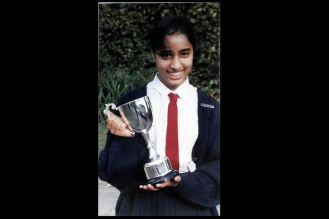 Anisha Hansrod with a trophy for the most outstanding contribution in design technology