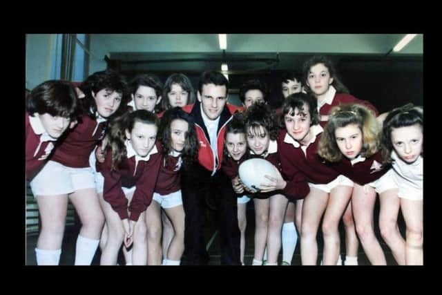 The school rugby league team scrum down with Salford RL star Steve Kerry