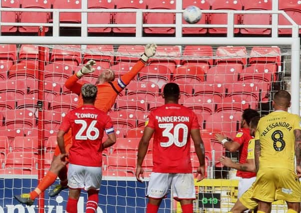 Barry Roche makes a fingertip save