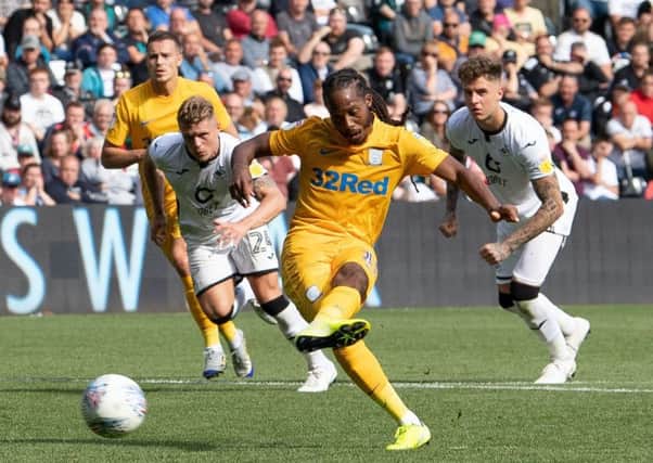 Daniel Johnson scores for Preston from the penalty spot against Swansea City in August