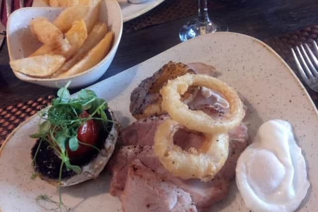 10oz gammon steak with pineapple, egg, mushroom, tomato, onion rings and chips