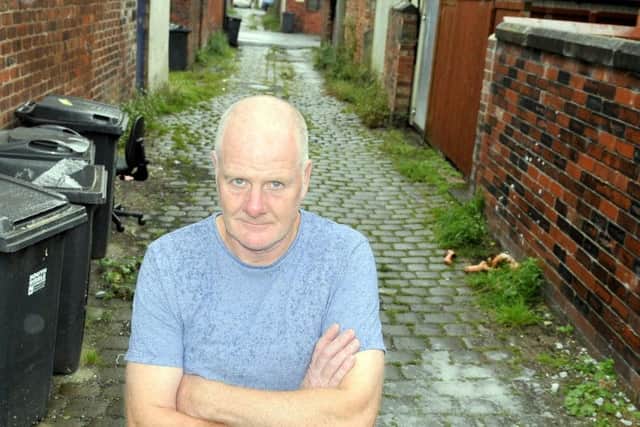 John said buckets, mattresses and old worktops have been dumped in the back alley of Victoria Street.