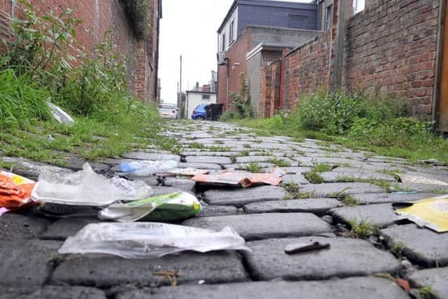 Coun. Matthew Trafford is campaigning for the back streets of Lostock Hall to be cleaned up.