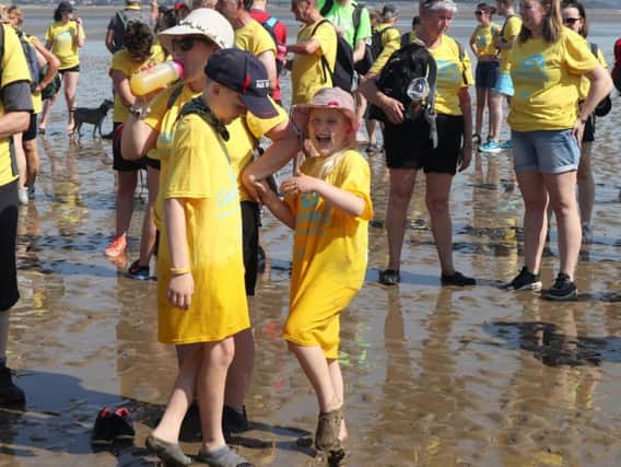 Families taking part in Galloway's Morecambe Bay Walk