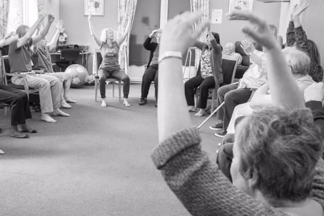 Dance and Parkinson's participants in a seated class.