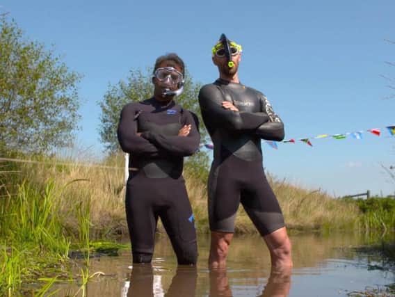 Neil Rutter and Inside Out West presenter Sabet Choudhury taking part in the annual bog snorkelling world championships