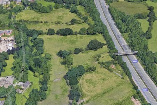 The plot of land next to the M61 where the homes will be built