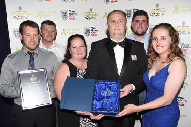 Pictured from left to right receiving Lancashire FAs Club of the Year 2019award are Jon Ingham (coach), Dave Elsdon (coach), Roseann Cartwright (welfare officer), Darryl Cartwright (chairman), Kirk Marsden (coach), Caitlin Dodd (coach and youth committee leader). Photo by Clive Lawrence.