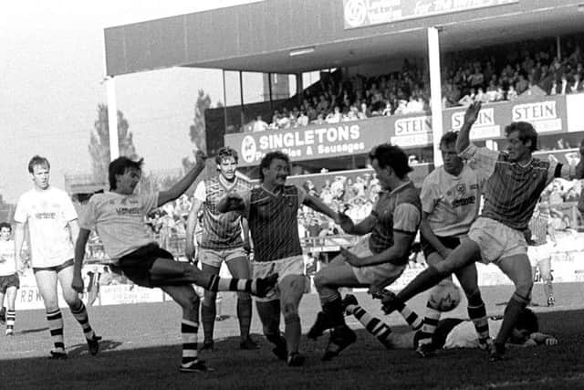 Preston midfielder Brian Chippendale has a shot blocked in a penalty-box scramble against Chester at Deepdale in October 1985