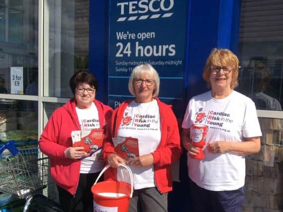 Sheila Wiggins, Ann Coles and Christine Abram raise money for CRY at Tesco, in Leyland