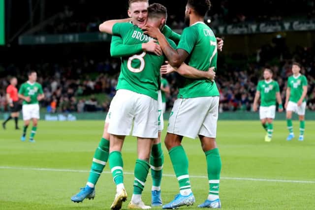 Alan Browne is congratulated by Ronan Curtis and Cyrus Christie after scoring against Bulgaria in Dublin