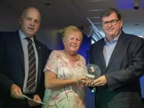 Anne Ellwood and Nick Holme (right), of Lancashire Remembers were awarded an award in the fund-raiisng category in the Royal British Legion Greater Manchester and Lancashire Area Awards