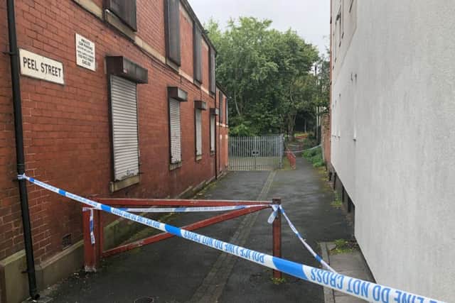 A police cordon in place on Peel Street in Radcliffe