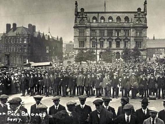 D Company of the 7th Battalion, Loyal North Lancashire Regiment, also known as Preston Pals, forming up on the Flag Market on September 7, 1914 before marching to Preston railway station and off for military training