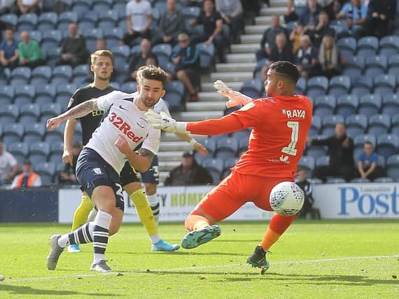 Sean Maguire fires Preston into the lead against Brentford at Deepdale