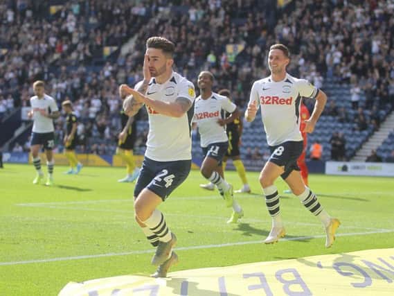 Sean Maguires celebrates giving Preston an early lead against Brentford