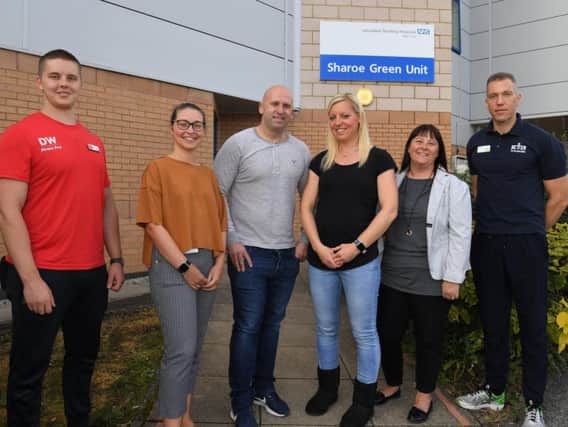 Lizz and Nick Davidson are raising money for cuddle cots at RPH with fundraising events, from left Matt Williamson of DW Sports. Specialist Midwife Lauren Dawson, Nick and Lizz Davidson, Kate Raynor and David Foolkes of Fulwood Leisure Centre